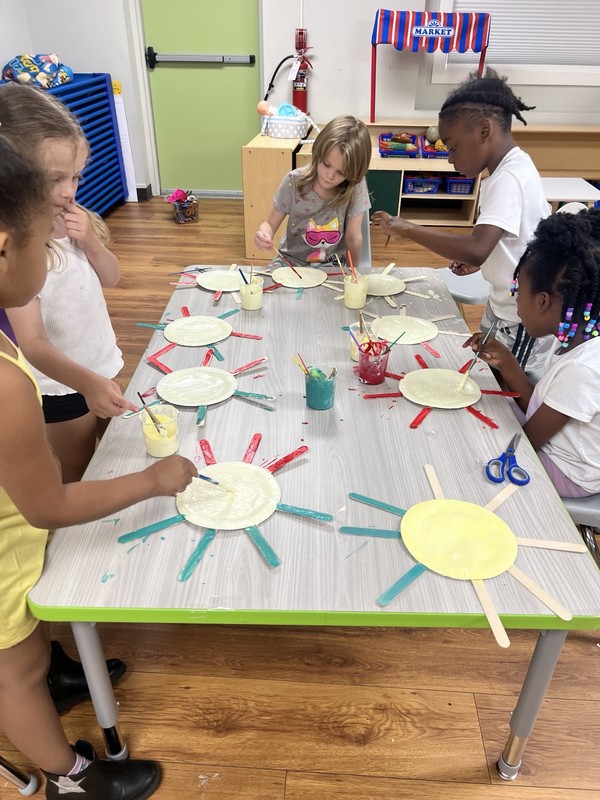 Youth creating artwork together at Guided Grace FYS